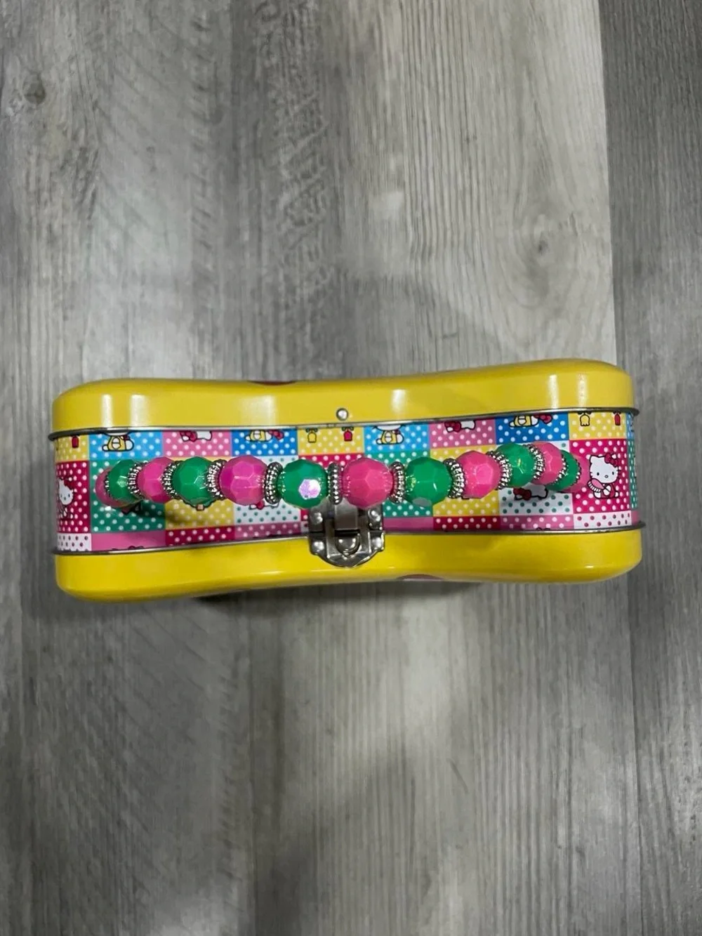 BRAND NEW Hello Kitty Sanrio yellow tin purse with beaded handle